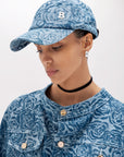 Baseball cap in rose print denim