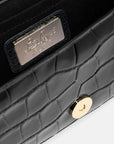Crocodile-print leather clutch