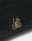 Crocodile-print leather clutch