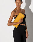 Patent leather clutch bag