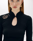 Fitted knit top with tulle roses