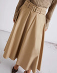 MiLA Boutique beige water-repellent stretch cotton satin circle skirt with belt and pockets.