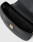 MiLA Boutique black leather Choupette top handle bag with gold push-lock closure and interior logo.