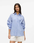 MiLA Boutique blue and white striped cotton shirt with raglan sleeves and embroidered chest patch.