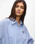 MiLA Boutique blue and white striped cotton shirt with raglan sleeves and embroidered Karl patch on chest.
