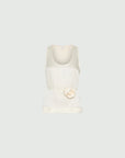 MiLA Boutique cream crinkle twill sleeveless top with rounded neckline and fabric flower accent.