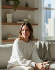 MiLA Boutique cream cotton sweater with puff raglan sleeves featuring crochet-effect texturing and round neckline.