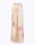 MiLA Boutique wide-leg satin trousers with a delicate rose print in cream and pink, featuring an elasticated waistband and relaxed fit.
