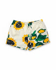 MiLA Boutique cream shorts with a vibrant all-over sunflower print and adjustable drawstring waist.