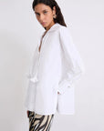 MiLA Boutique white cotton poplin shirt with a matching neckerchief adorned with a fabric flower, regular fit, side slits.