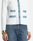 MiLA Boutique white textured knit cardigan with blue trim and gold button details, round neckline, faux pockets.