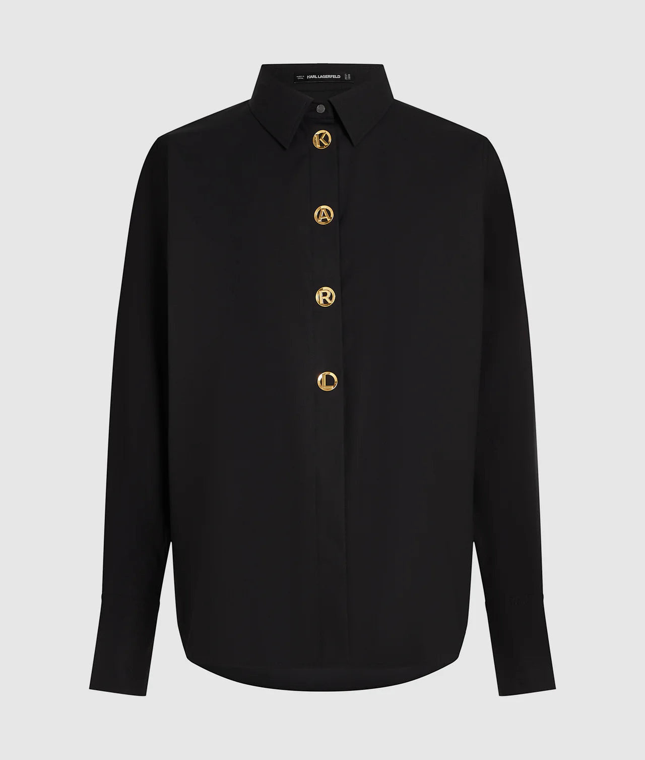 MiLA Boutique black long-sleeve shirt with pointed collar and gold KARL lettered snap buttons.