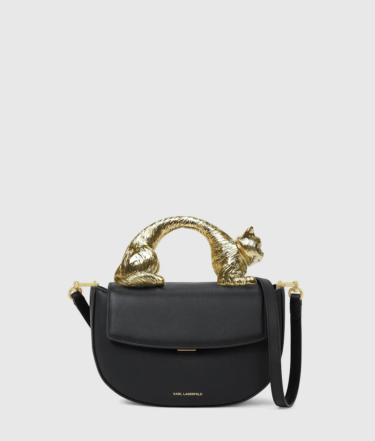 MiLA Boutique black leather Choupette top handle bag with gold cat-shaped handle and detachable strap.
