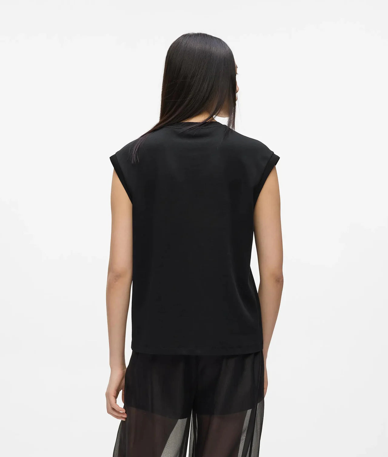 MiLA Boutique black sleeveless organza panel tank top with signature embroidery. Crew neckline, sheer upper panel.