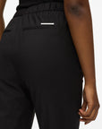 MiLA Boutique black wool-blend tailored pants with elasticated back waistband and Karl Lagerfeld logo rivet.