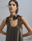 MiLA Boutique brown crinkle twill sleeveless dress with scoop neck and fabric flower detail choker.
