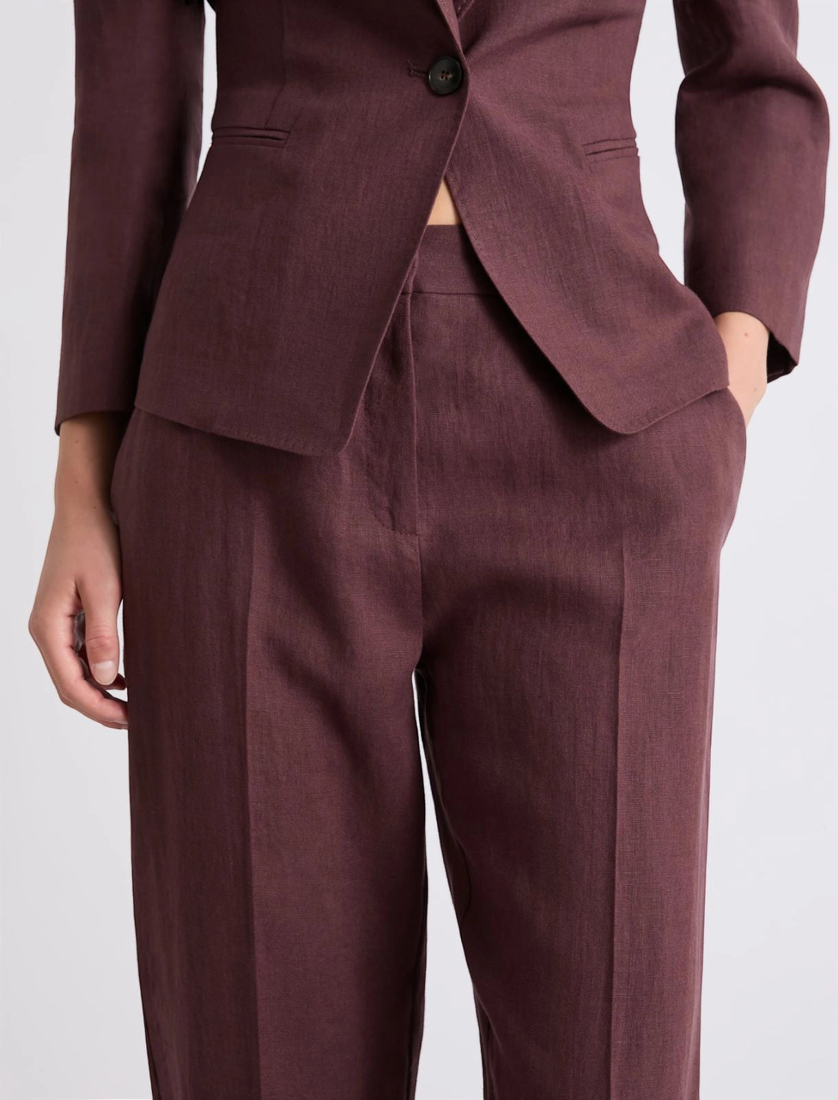 MiLA Boutique brown linen canvas chino trousers with sharp creases and slant pockets.