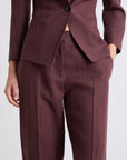 MiLA Boutique brown linen canvas chino trousers with sharp creases and slant pockets.