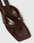 MiLA Boutique dark brown reptile-print square-toe flip flops with a 4cm lacquered heel and leather lining.