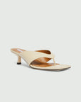 MiLA Boutique cream leather square-toe thong sandals with a 4cm lacquered heel and leather lining.