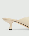 MiLA Boutique cream reptile-print square-toe mules with a 4cm lacquered heel and leather lining.