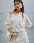 Marella cream V-neck sweater with raglan sleeves and slip-stitch detailing, worn by a model.