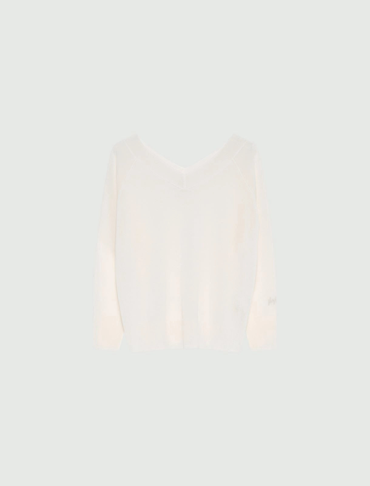 MiLA Boutique cream V-neck sweater in tulle-look viscose-blend yarn with raglan sleeves and embroidered logo detail.