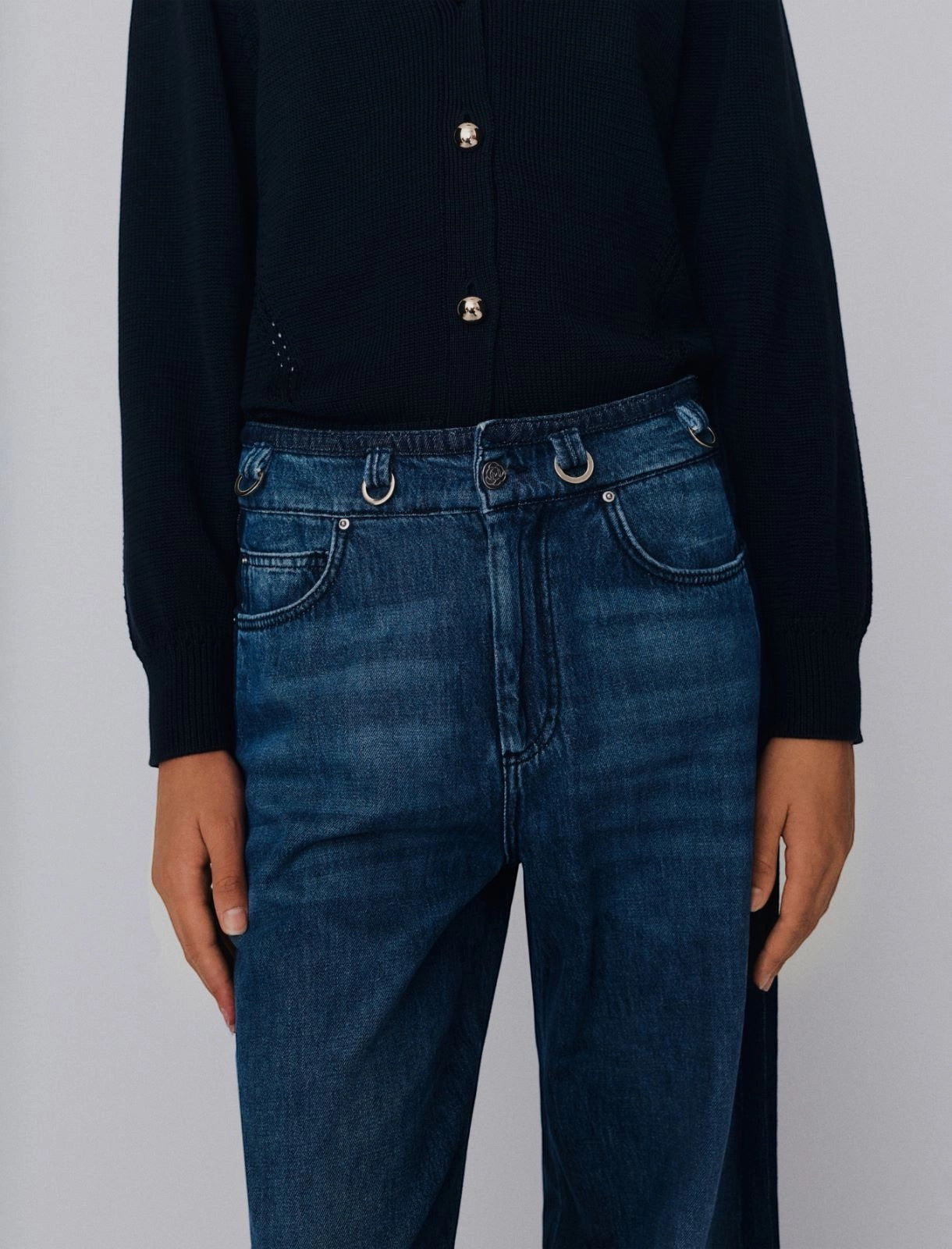 MiLA Boutique dark wash denim high-waisted wide-leg jeans with silver hardware and subtle side accents.