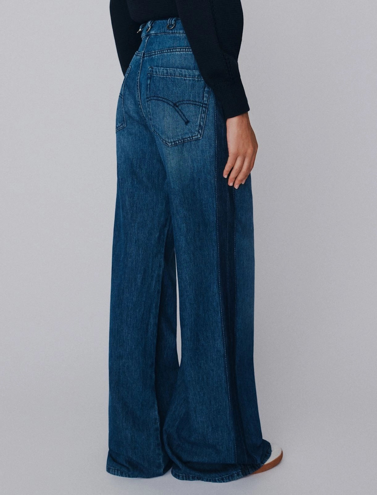 MiLA Boutique high-waisted blue denim wide-leg jeans with darker side accents and rear pocket topstitching.