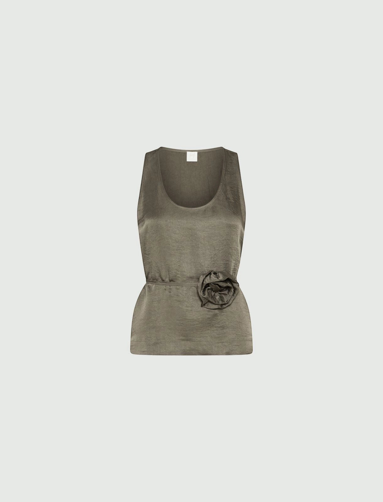MiLA Boutique olive green crinkle twill sleeveless top with rounded neckline and fabric flower accent on the waist.