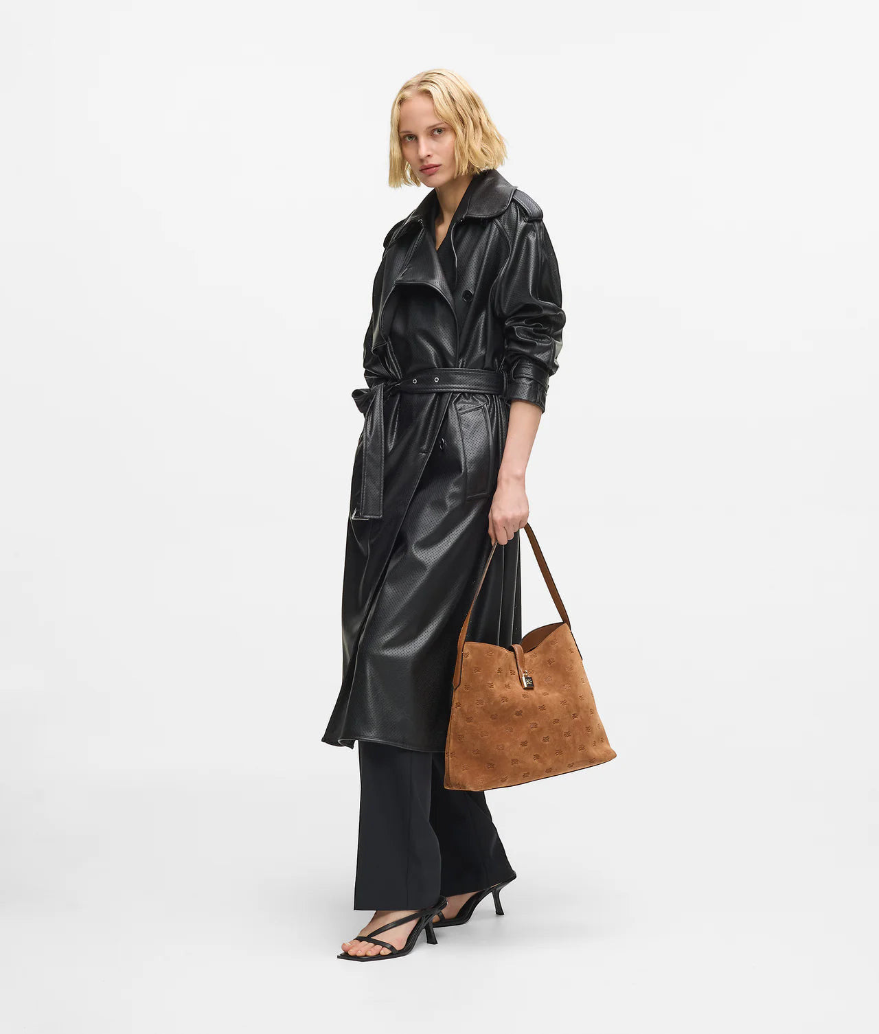 MiLA Boutique tan suede hobo bag with all-over Karl autograph embossment and padlock detail.