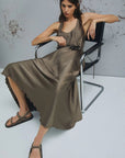 MiLA Boutique taupe crinkle twill dress with scoop neck, fabric belt with flower detail, and asymmetrical hem.