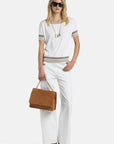 MiLA Boutique white viscose-blend knit sweater with boat neck, short sleeves, and metallic yarn accents on cuffs and hem.
