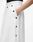 MiLA Boutique white A-line midi skirt with black button details and pockets