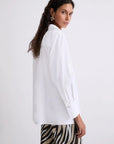 MiLA Boutique white cotton poplin shirt with a classic collar and concealed button fastening, featuring a unique neckerchief detail.