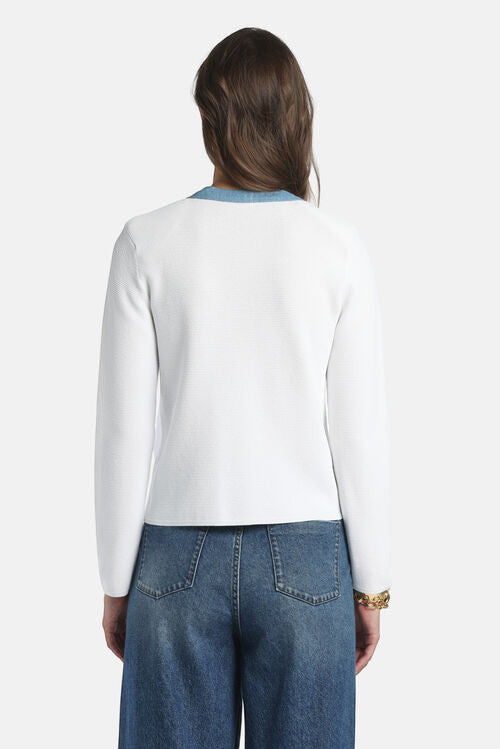 MiLA Boutique white textured knit button front cardigan with blue trim and faux pockets. Model wears jeans.