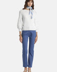MiLA Boutique white cotton sweater with puff raglan sleeves featuring crochet-effect texturing, round neckline, and flat-rib trims.