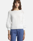MiLA Boutique white cotton sweater with puff raglan sleeves featuring crochet-effect texturing and round neckline.