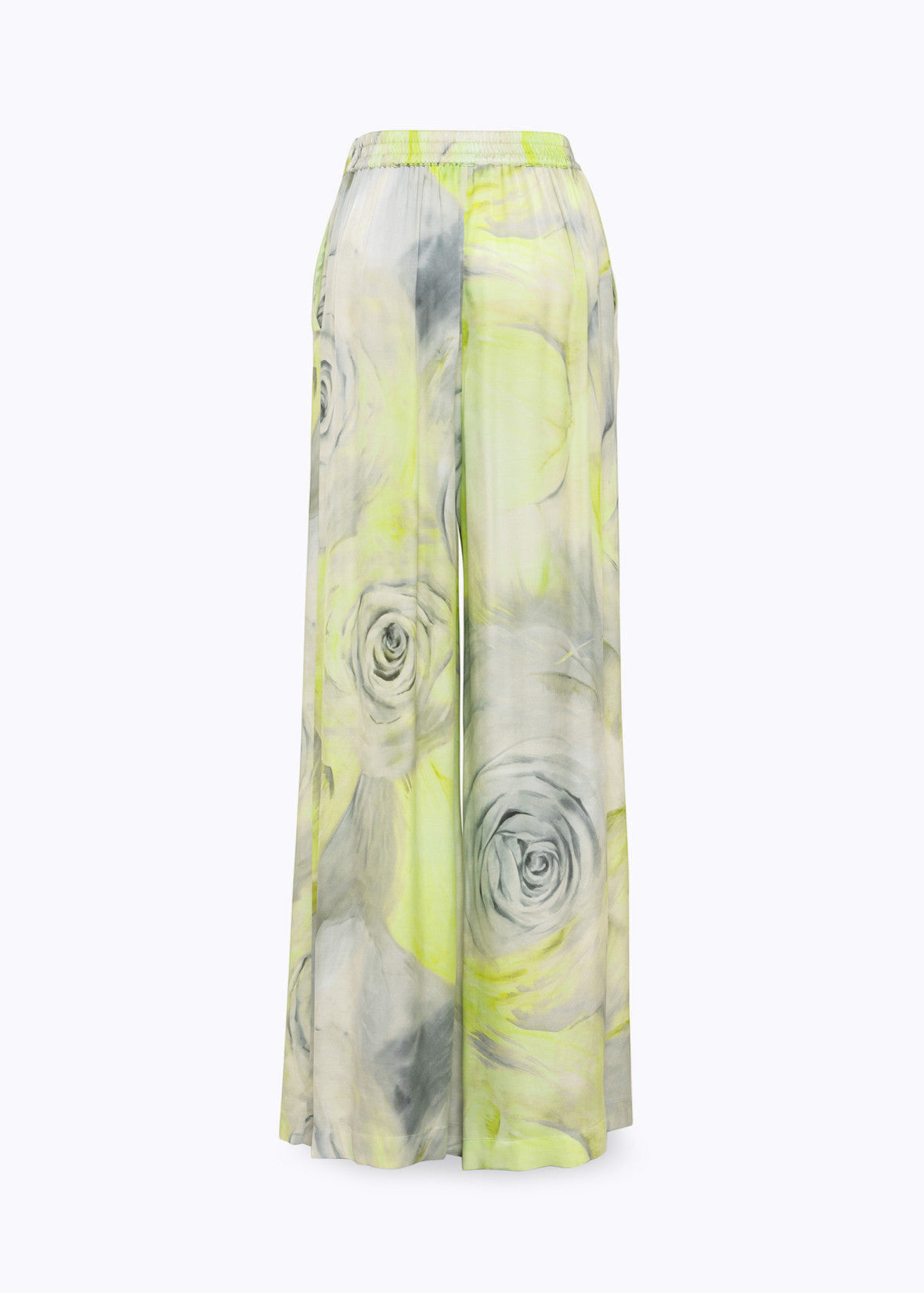 MiLA Boutique wide-leg satin trousers with a grey and yellow rose print, elasticated waistband, and side pockets.